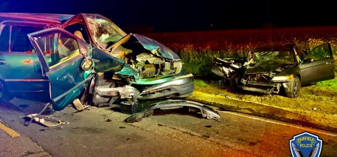 Sideshow, head-on collision, hostile crowd