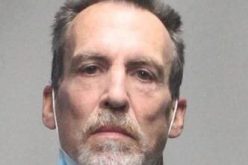 Probationer arrested for carrying gun