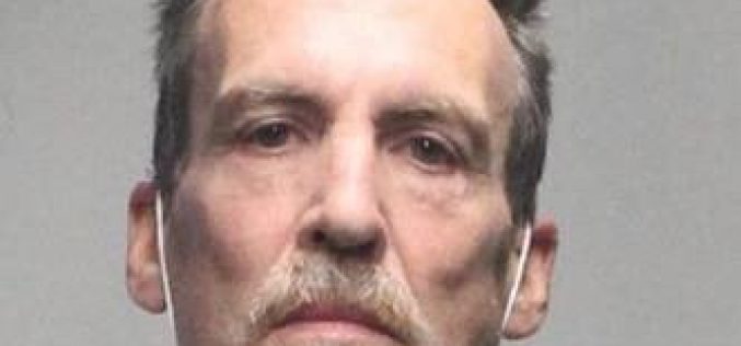 Probationer arrested for carrying gun