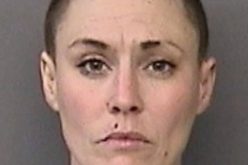 Woman on parole arrested after hiding in bathroom with drugs