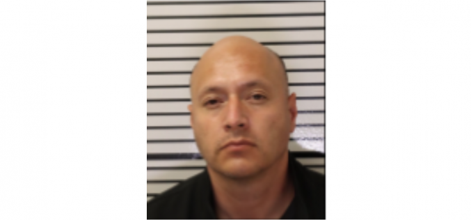 Police: Man on parole caught with loaded (and stolen) gun, narcotics, and more