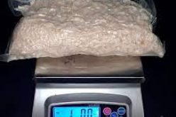 Drug house has meth, 11 illegal guns and cash