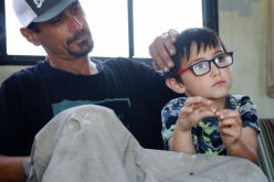 Men in Custody Charged with Murdering an RV Dweller