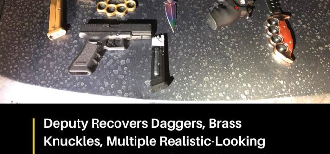 Dagger, brass knuckles and replica firearms