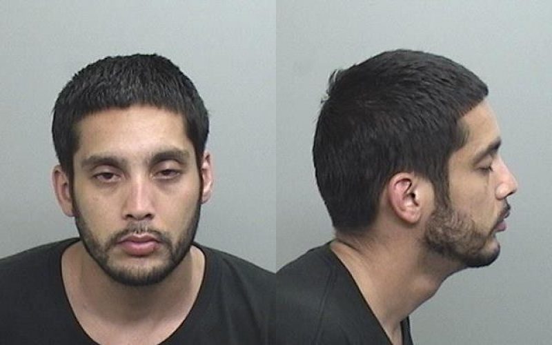 Man with warrant, drugs, fraudulent checks, pipe