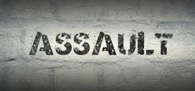 Man hits another with softball-sized rock