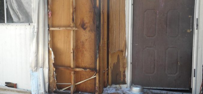 Man arrested for front porch arson