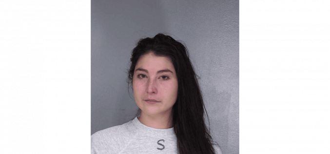 Woman arrested after leaving infant in vehicle