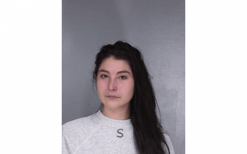 Woman arrested after leaving infant in vehicle