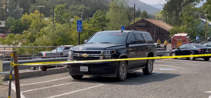 Man arrested for shooting another in the back