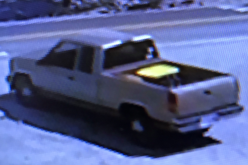 Man sets fire to American flag attached to a truck, with 3 children inside