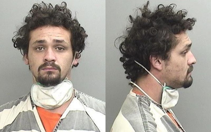 Man arrested in assault and vandalism incident