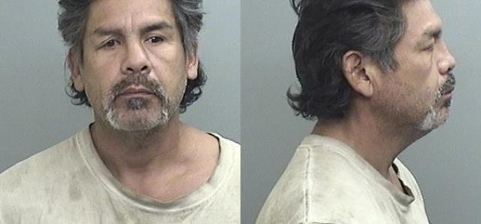 Driver has warrant, stolen gun, meth