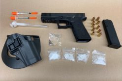 Suspect arrested with a loaded handgun
