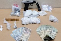 Convicted felon caught with gun and drugs