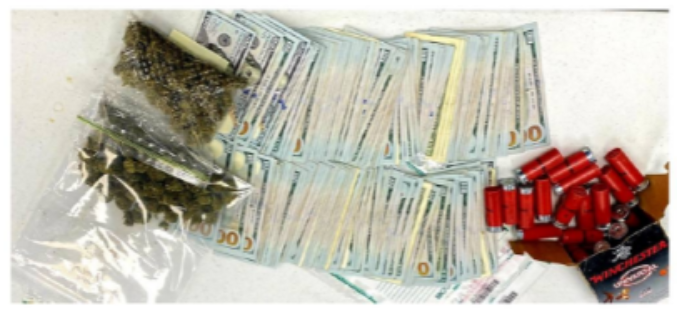 Man has outsanding warrant to go with his marijuana and ammo