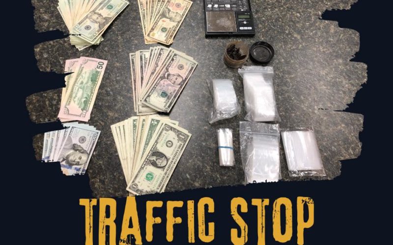 Woman driving with heroin, pipes, cash