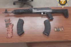 Driving with no license plates, but with meth, rifle, ammo