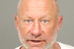 Released inmate picks up gun left in bathroom