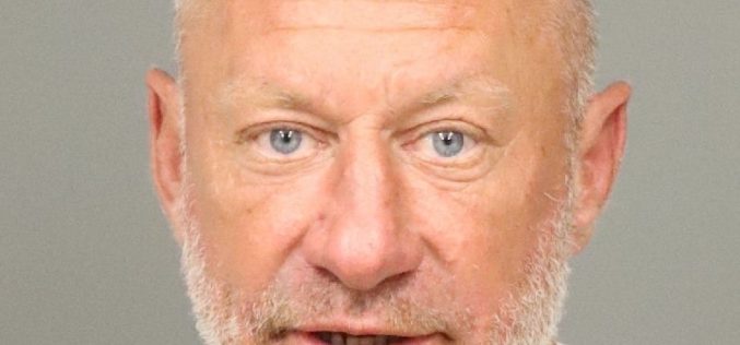 Released inmate picks up gun left in bathroom