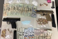 Pair arrested with gun and drugs in car, residence