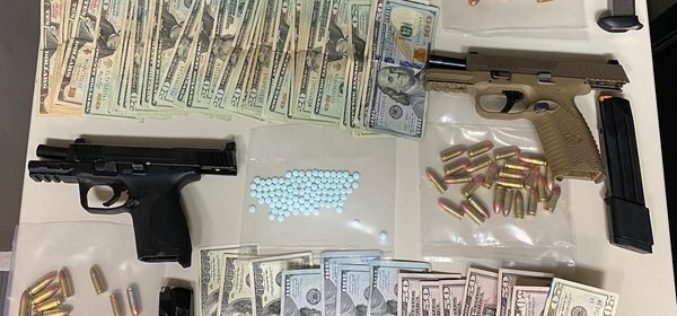 Pair arrested with gun and drugs in car, residence