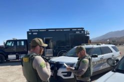 Man holds dynamite in hotel room