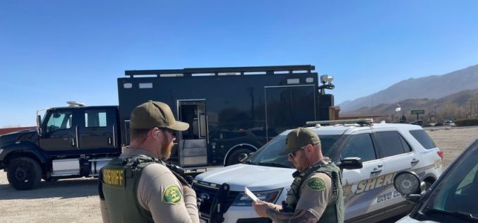 Man holds dynamite in hotel room