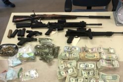 Cache of drugs, cash and five guns