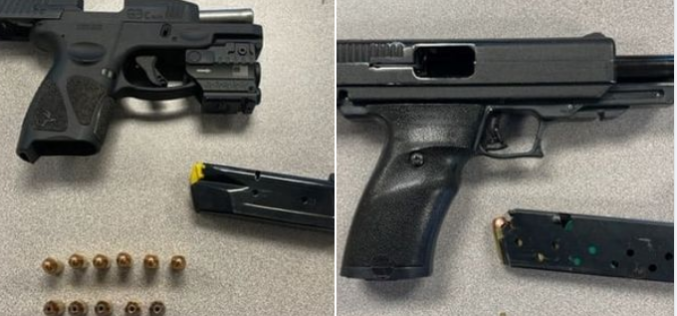 Two arrested, two guns seized
