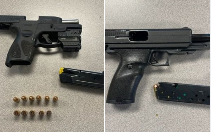 Two arrested, two guns seized