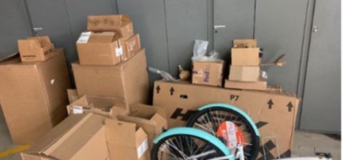 Trio caught stealing packages from train cargo container