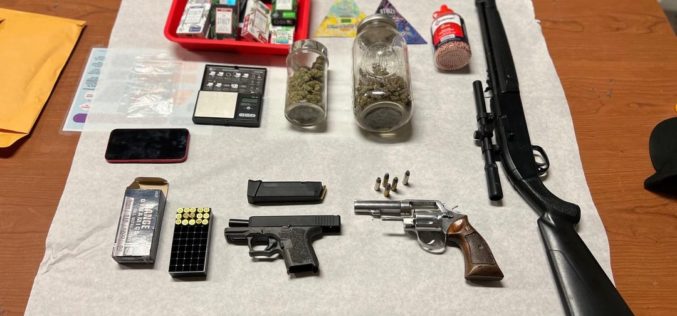 2 adults in car arrested with guns, drugs, open containers