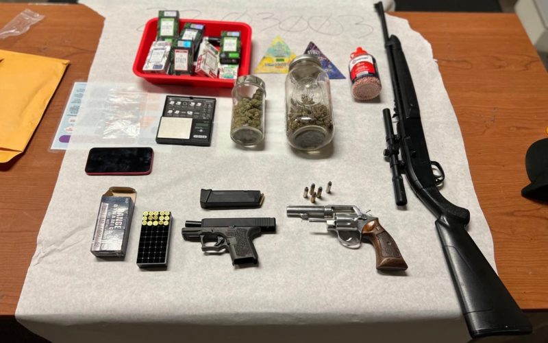 2 adults in car arrested with guns, drugs, open containers