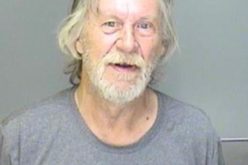 Man assaults roomate with walking cane