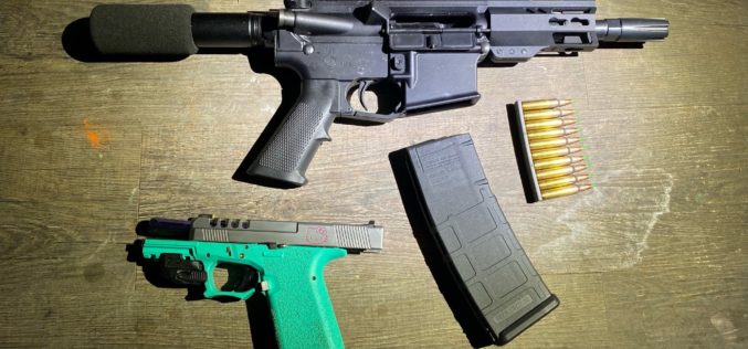 Armed man threats, holes up in a house