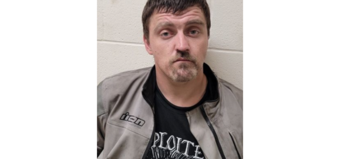 Police: Man caught driving motorcycle on flat tire arrested for alleged drug possession, warrants