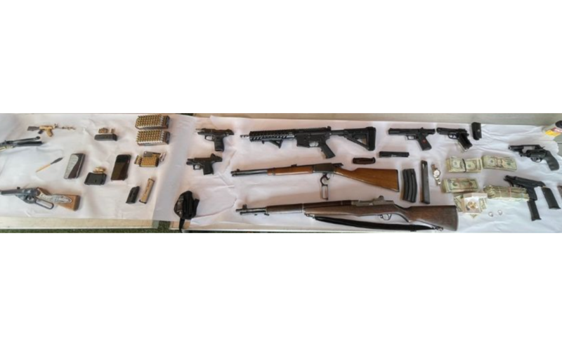 Parolee reportedly caught with nine guns in home