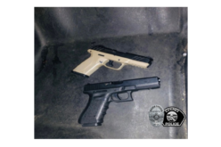 Robbery suspect reportedly caught with two handguns