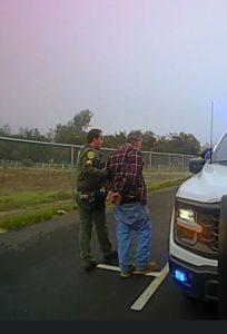 suspect under arrest - courtesy of acso