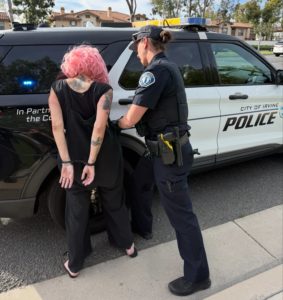 female suspect under arrest - courtesy of irvine pd