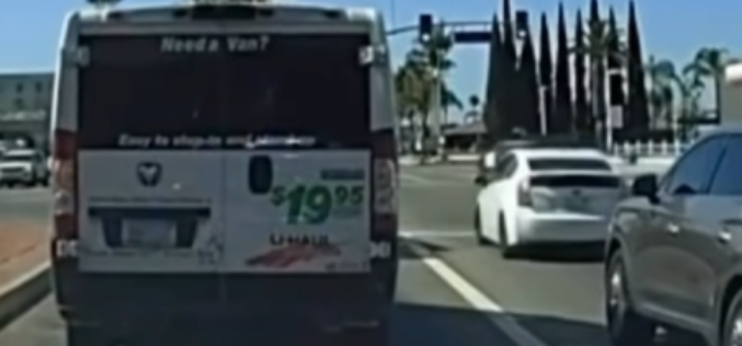Traffic Stop of U-Haul Van Reveals Stolen Police Gear, Loaded Firearm, and Outstanding Warrants