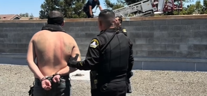 Man Hanging Out On Store Roof Arrested