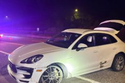 Driver Arrested Following Vehicle Pursuit of White Porsche SUV and Spike Strip Deployment