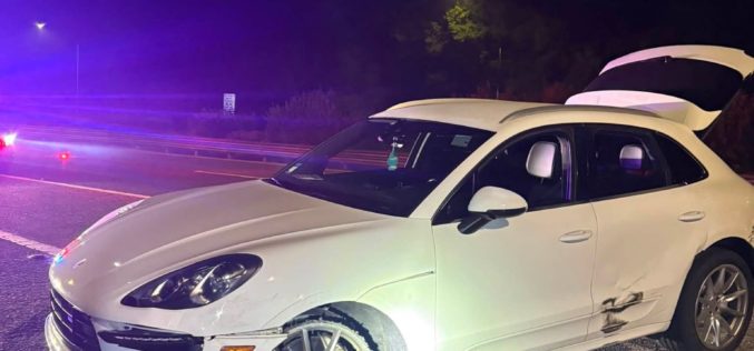 Driver Arrested Following Vehicle Pursuit of White Porsche SUV and Spike Strip Deployment