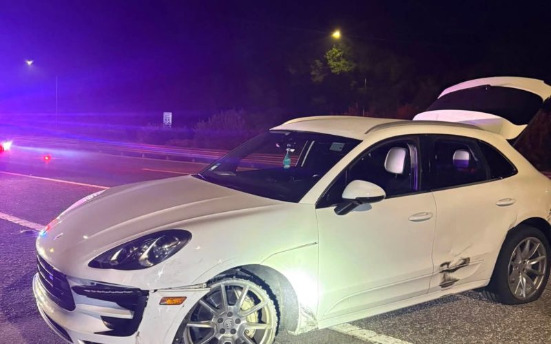 Driver Arrested Following Vehicle Pursuit of White Porsche SUV and Spike Strip Deployment