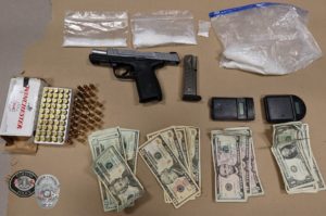 Gun, ammo, narcotics, and cash