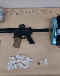 Counterfeit pills and Rifle